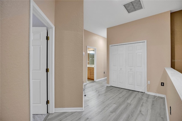 hall featuring light hardwood / wood-style flooring