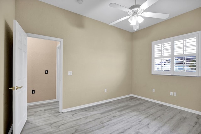 unfurnished room featuring ceiling fan and light hardwood / wood-style floors