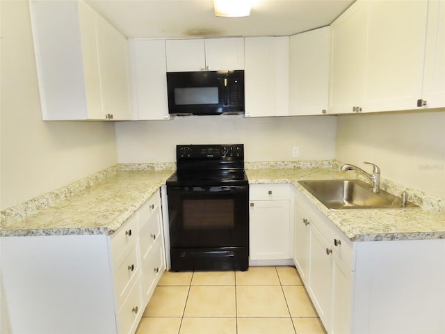 kitchen with white cabinets, light tile patterned floors, sink, and black appliances