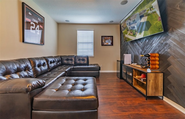 living room featuring dark wood-type flooring