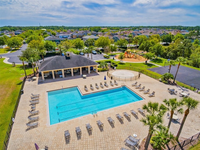 view of swimming pool with a patio area