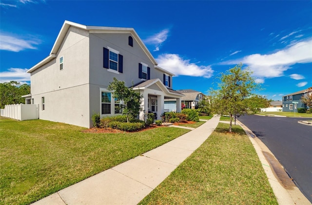 view of front of house featuring a front lawn