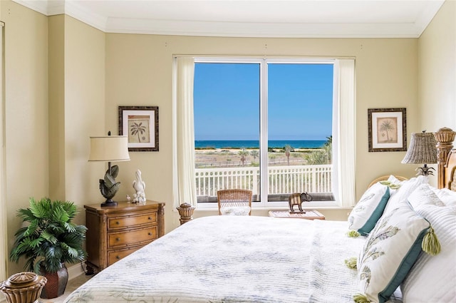 bedroom featuring a water view and crown molding