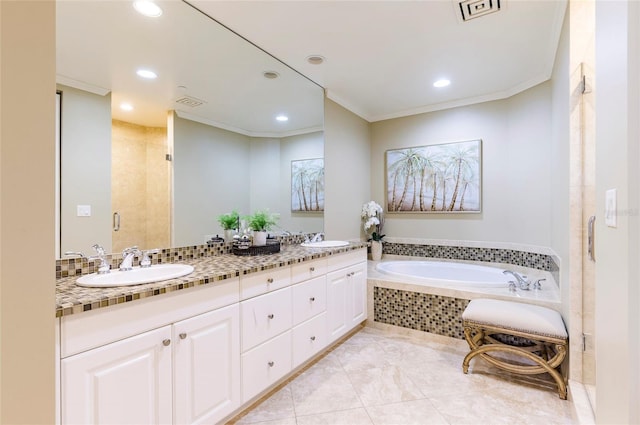 bathroom featuring tile patterned flooring, vanity, a relaxing tiled tub, and ornamental molding