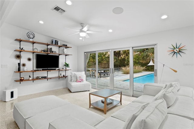 living room featuring ceiling fan