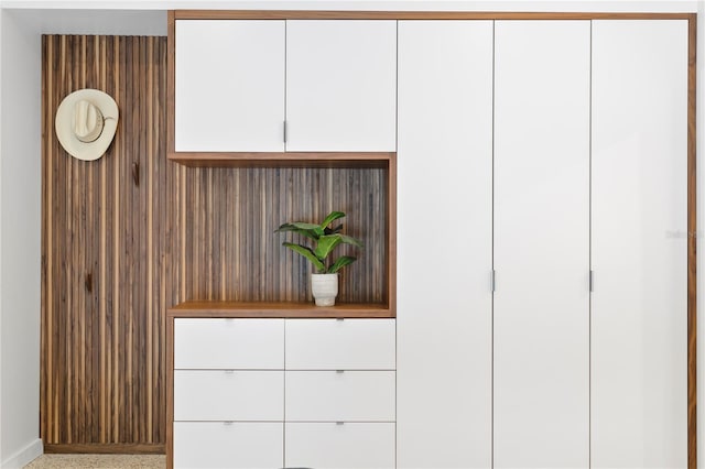 interior details featuring wooden walls