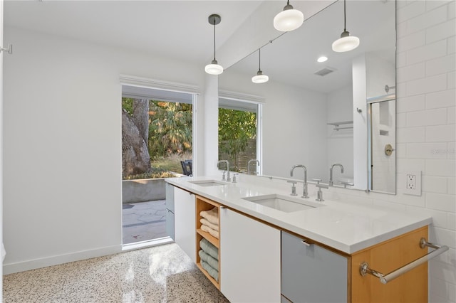 kitchen with sink and pendant lighting