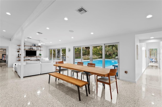 dining space with ceiling fan