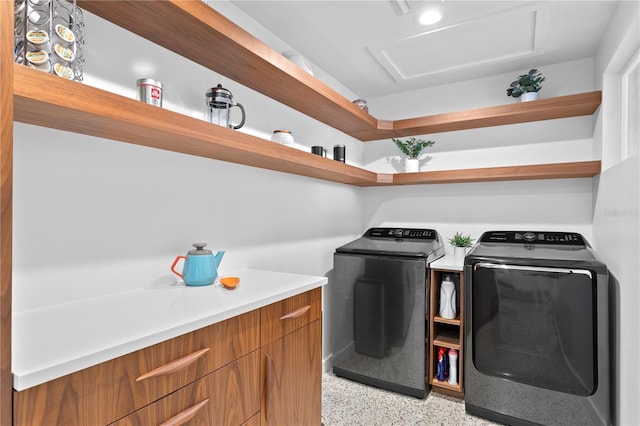 laundry room with washer and dryer