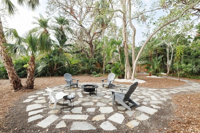 view of patio / terrace with a fire pit