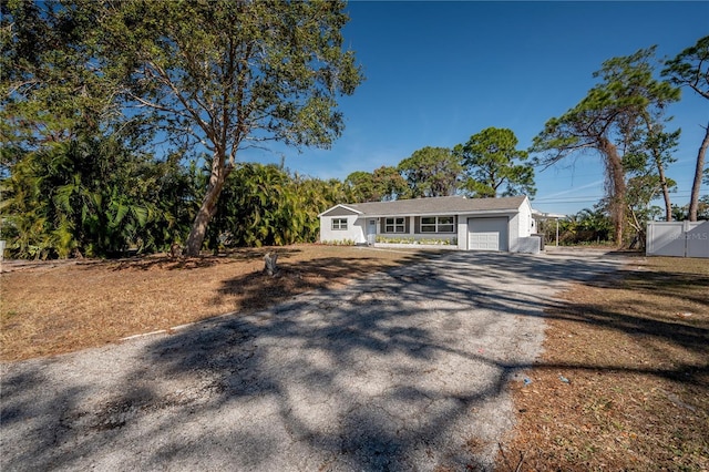 ranch-style home with a garage