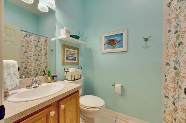 bathroom with a shower with curtain, toilet, tile patterned floors, and vanity