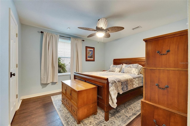 bedroom featuring ceiling fan and dark wood-type flooring