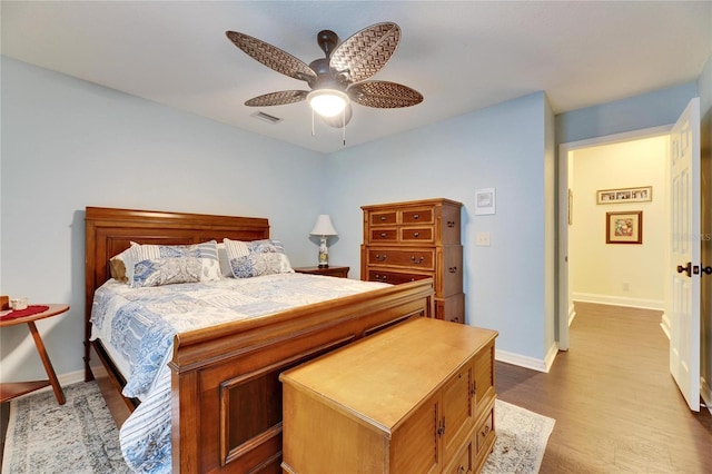 bedroom featuring ceiling fan and light wood-type flooring