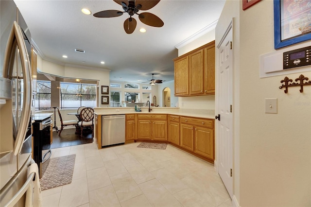 kitchen with light tile patterned floors, appliances with stainless steel finishes, ornamental molding, and kitchen peninsula