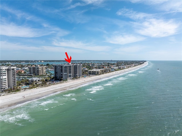 aerial view featuring a view of the beach and a water view