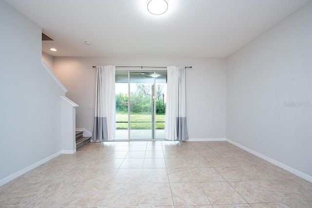 view of tiled spare room