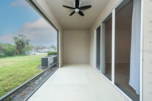 balcony featuring cooling unit and ceiling fan