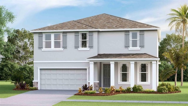 view of front facade with a front yard and a garage