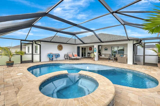 view of pool with an in ground hot tub, a lanai, an outdoor hangout area, and a patio