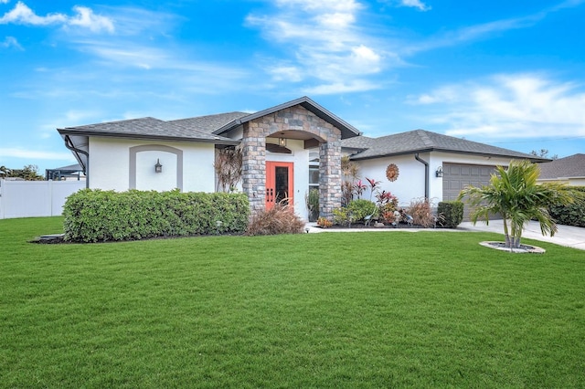 single story home with a garage and a front yard