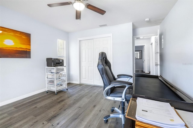 office space with hardwood / wood-style floors and ceiling fan