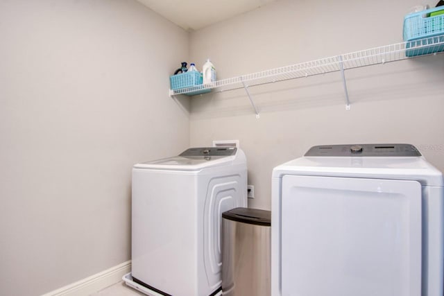 laundry room featuring washing machine and dryer