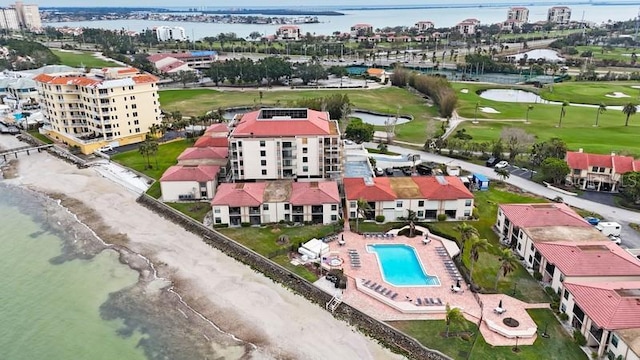 aerial view featuring view of golf course and a water view