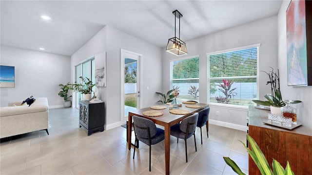 dining space with light tile patterned flooring