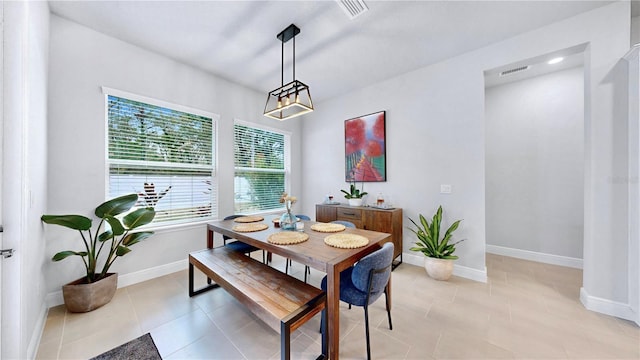 view of tiled dining space