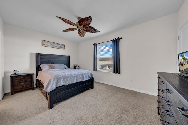 bedroom with light colored carpet and ceiling fan