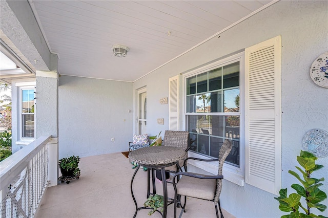 balcony featuring a porch