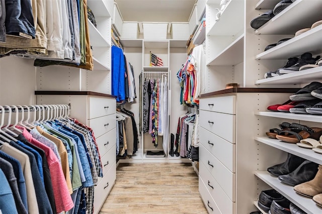 walk in closet featuring light wood-type flooring