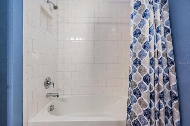 bathroom featuring shower / bath combo with shower curtain