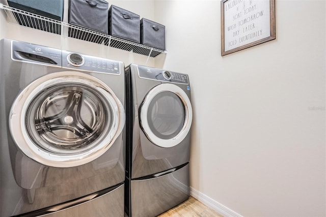 laundry room featuring independent washer and dryer