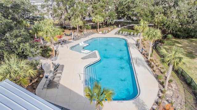 view of swimming pool with a patio