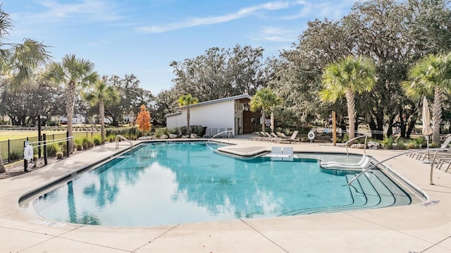 view of swimming pool featuring a patio