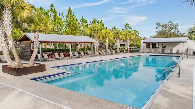 view of swimming pool with a gazebo and a patio area