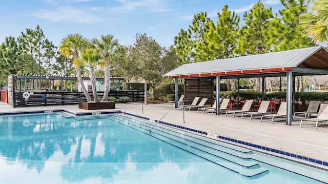 view of pool featuring a gazebo and a patio area