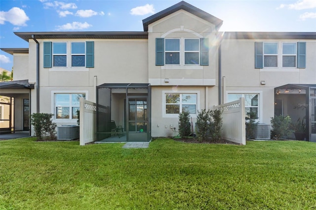 29913 Southwell Ln, Wesley Chapel, FL 33543 - back of property with stucco siding and a yard