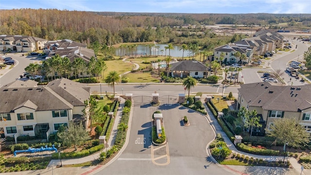 29913 Southwell Ln, Wesley Chapel, FL 33543 - aerial view of property and surrounding area with nearby suburban area, a heavily wooded area, and a large body of water