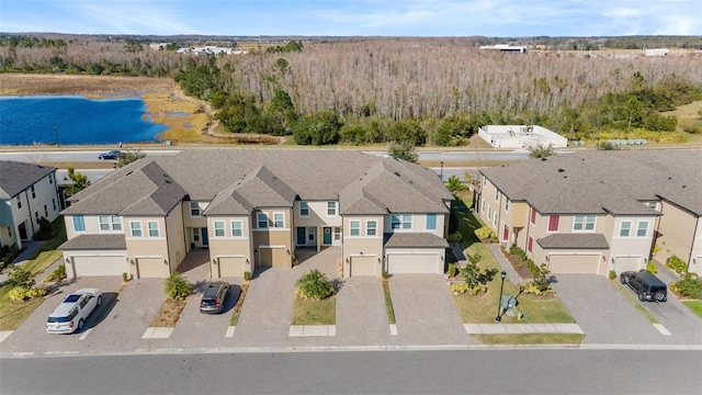 29913 Southwell Ln, Wesley Chapel, FL 33543 - aerial perspective of suburban area with a large body of water and a heavily wooded area