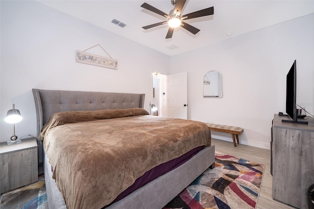 bedroom featuring hardwood / wood-style flooring and ceiling fan