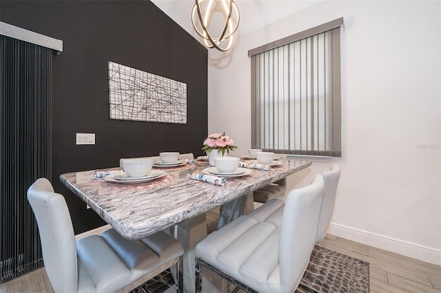 dining room featuring a chandelier