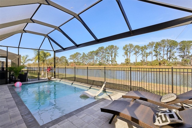 view of swimming pool with a fenced in pool, a water view, glass enclosure, a patio area, and a fenced backyard