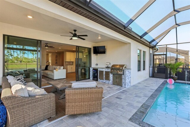 view of patio / terrace featuring grilling area, a lanai, outdoor lounge area, area for grilling, and an outdoor pool