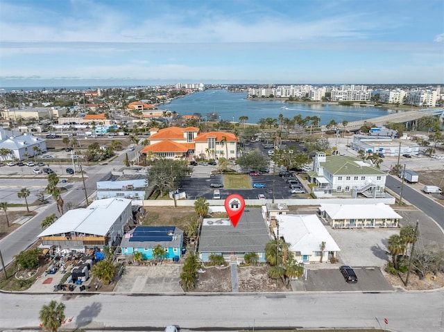 birds eye view of property featuring a water view