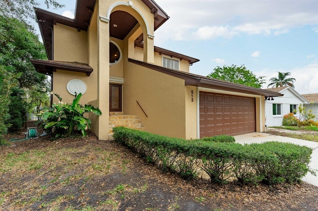 view of front of property featuring a garage