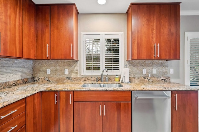 kitchen with sink, dishwasher, light stone countertops, and decorative backsplash