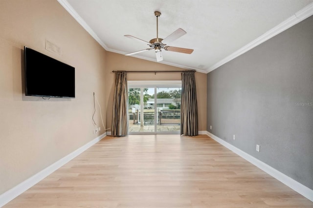 spare room with ceiling fan, ornamental molding, lofted ceiling, and light wood-type flooring